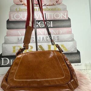 Bally Brown Leather Shoulder Bag with Red Strap Accents.